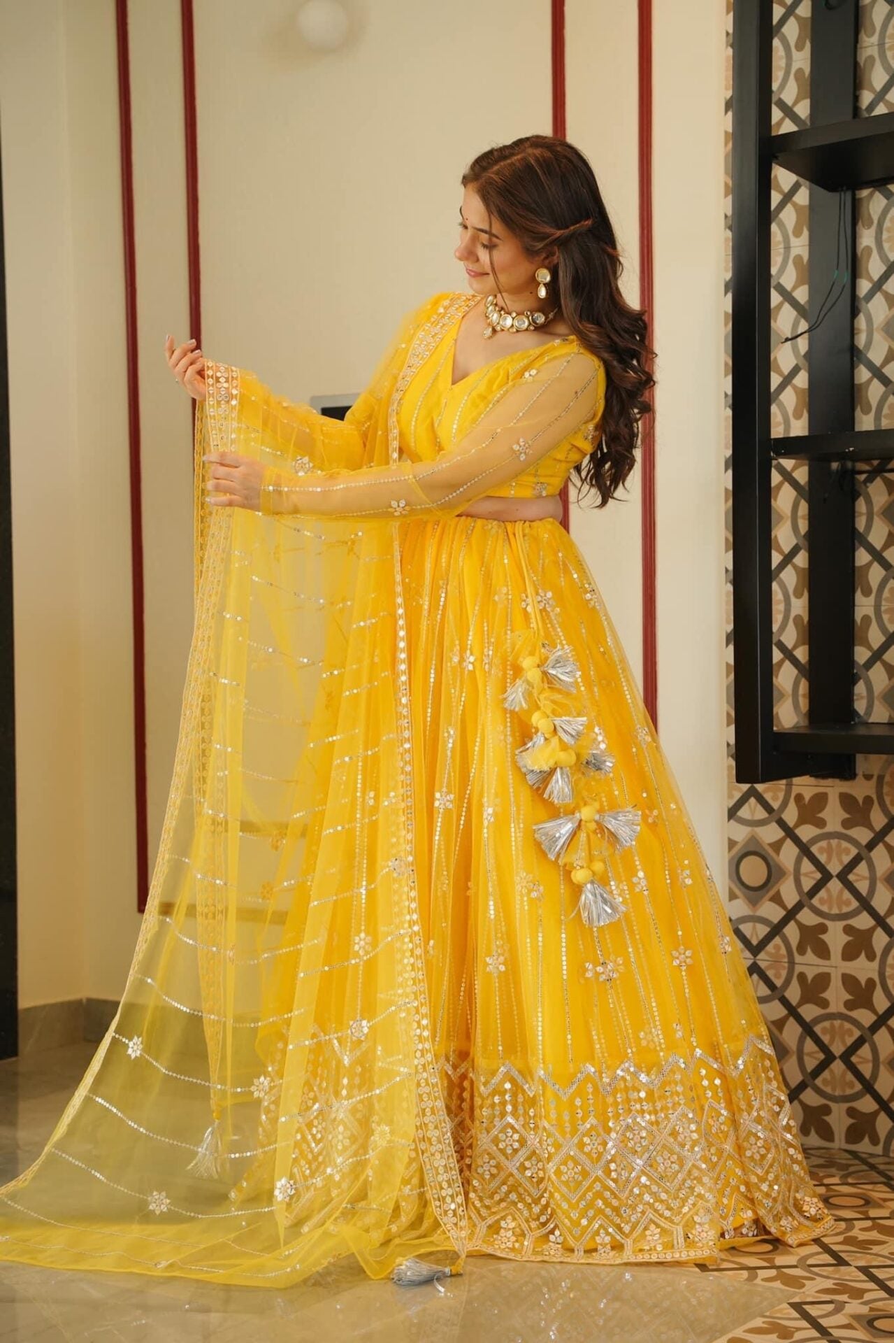 Aisha yellow net lehenga choli set