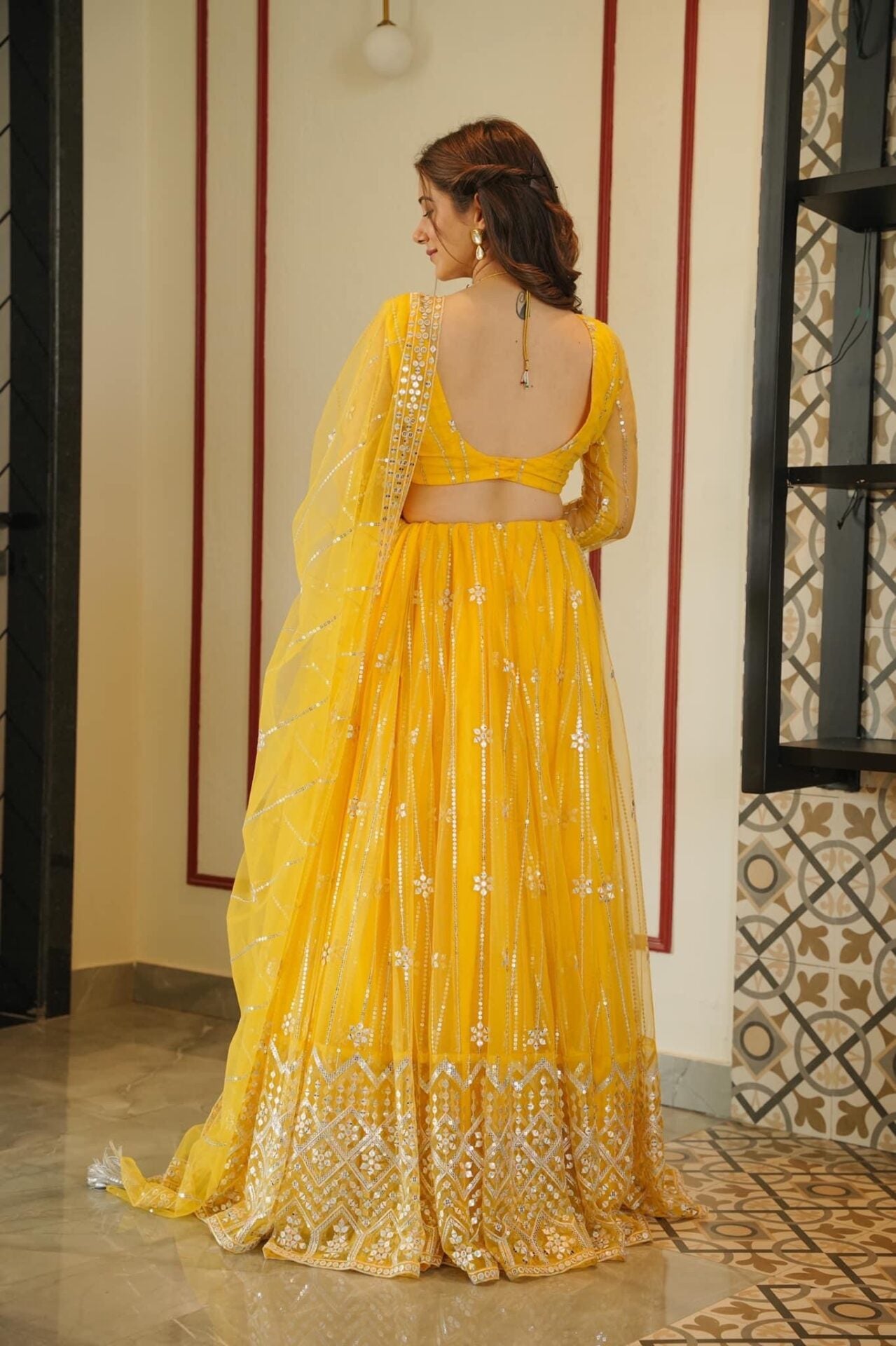 Aisha yellow net lehenga choli set