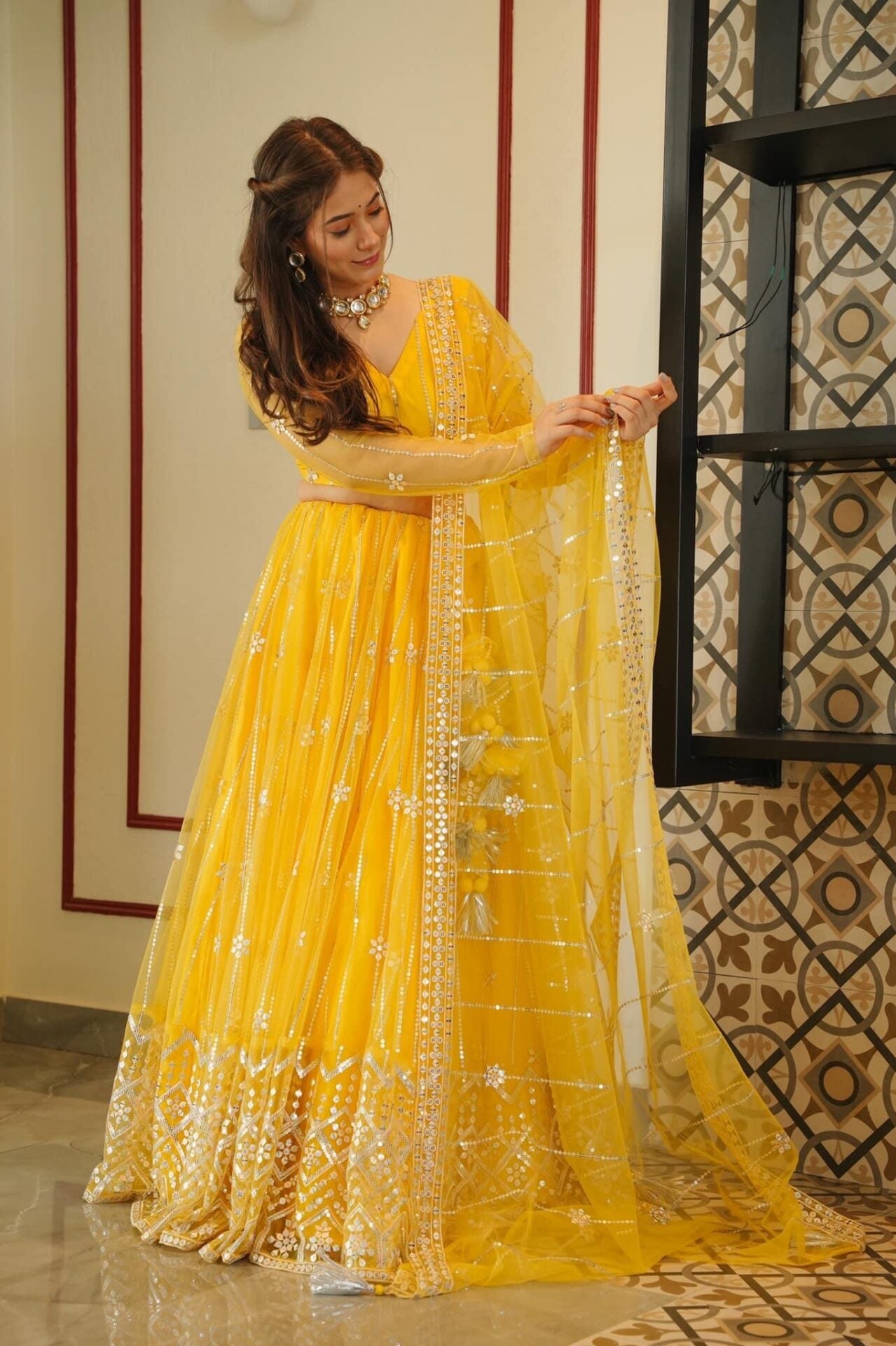 Aisha yellow net lehenga choli set