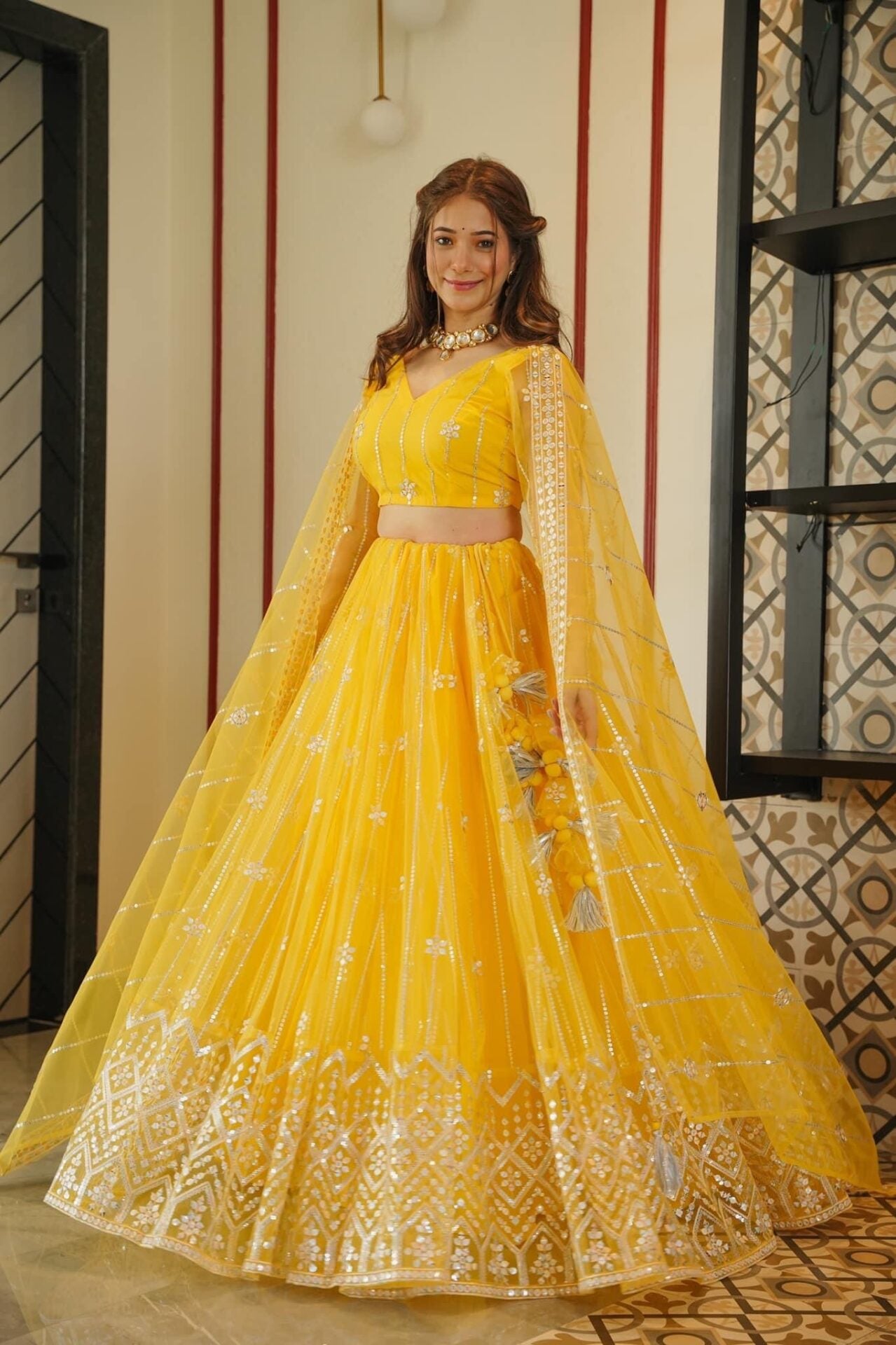 Aisha yellow net lehenga choli set