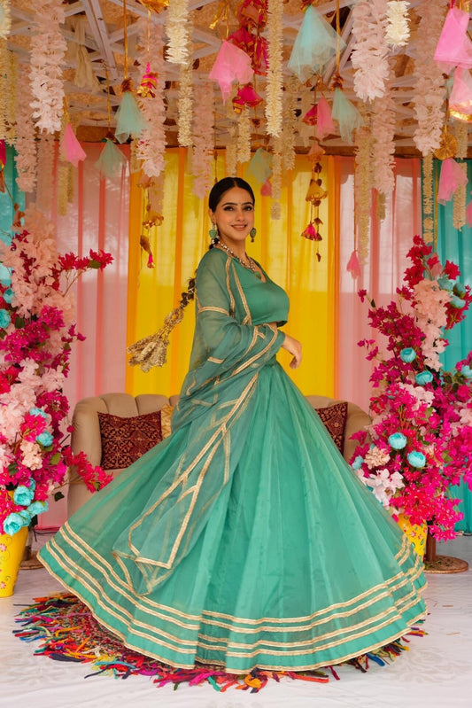 Sadhna green organza lehenga set