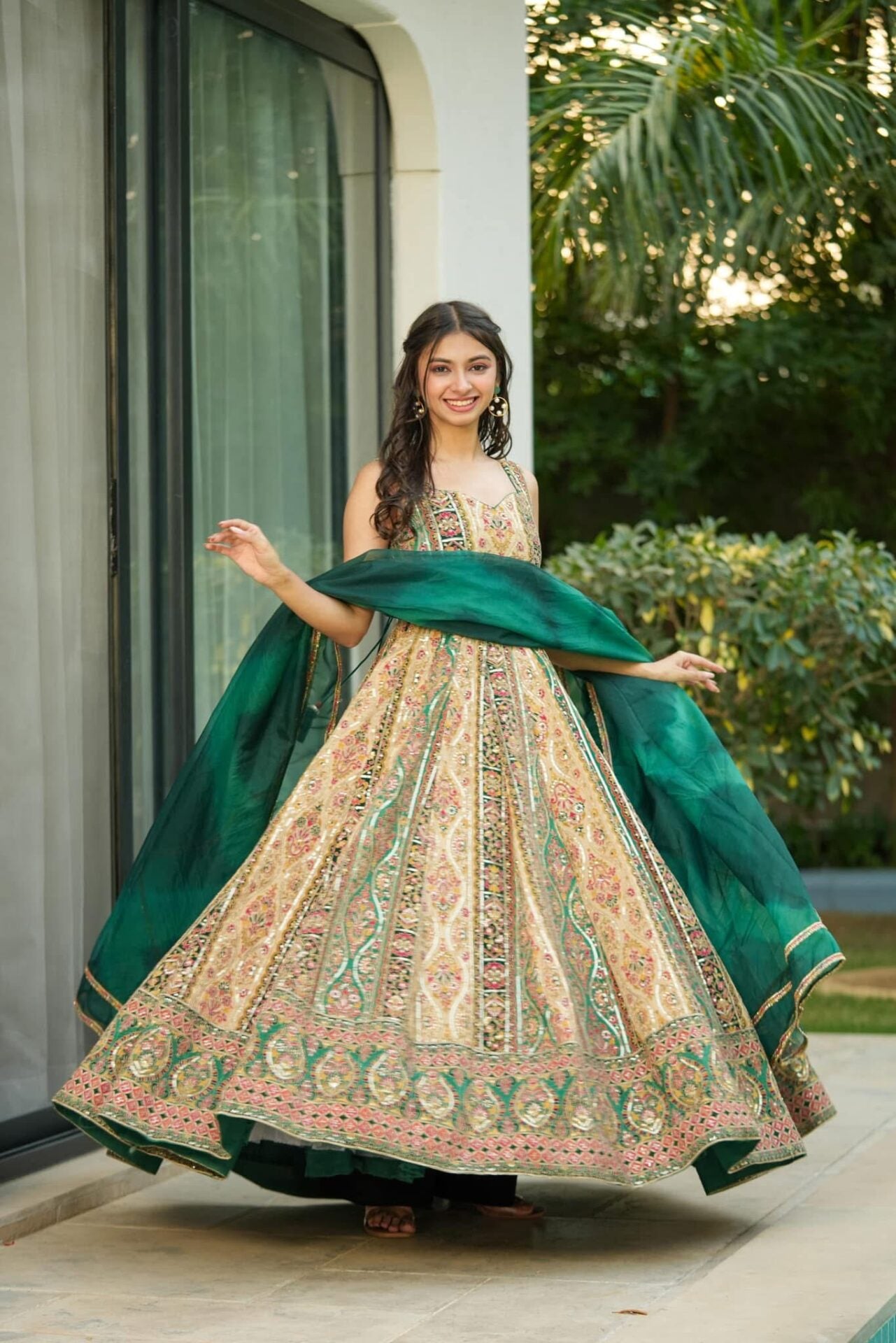 Triveni green heavy embroidered maxi