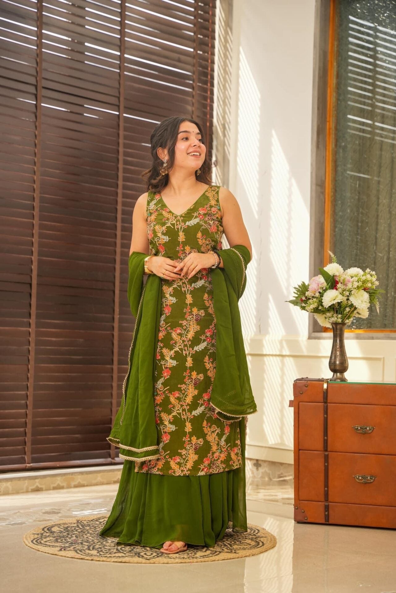 sakhi green heavy embroidered set